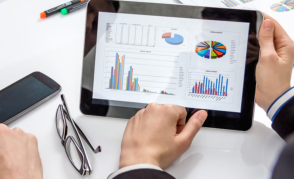 analyzing-annual-report-data-on-a-digital-tablet